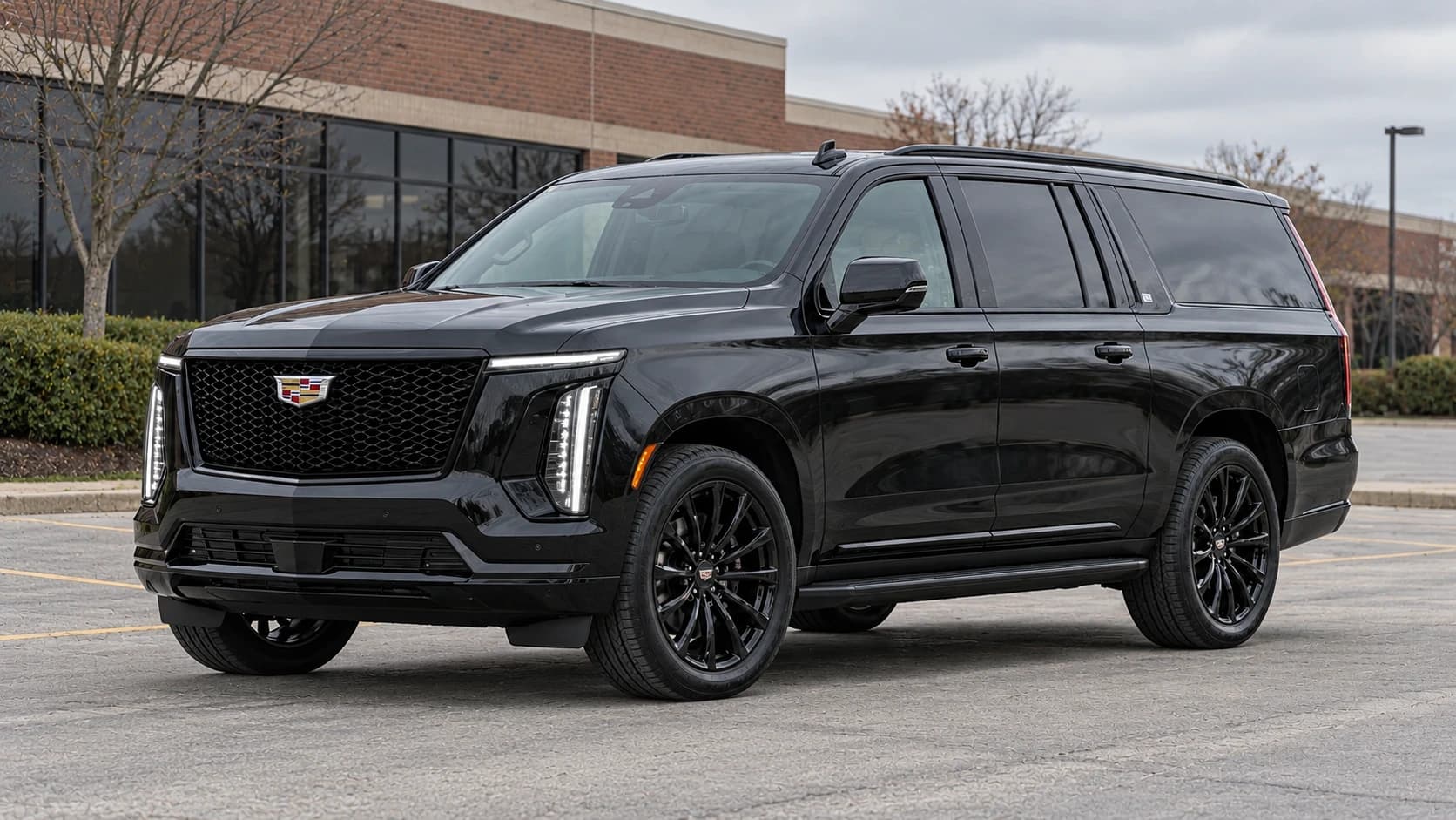 Black 2025 Cadillac Escalade ESV with black rims